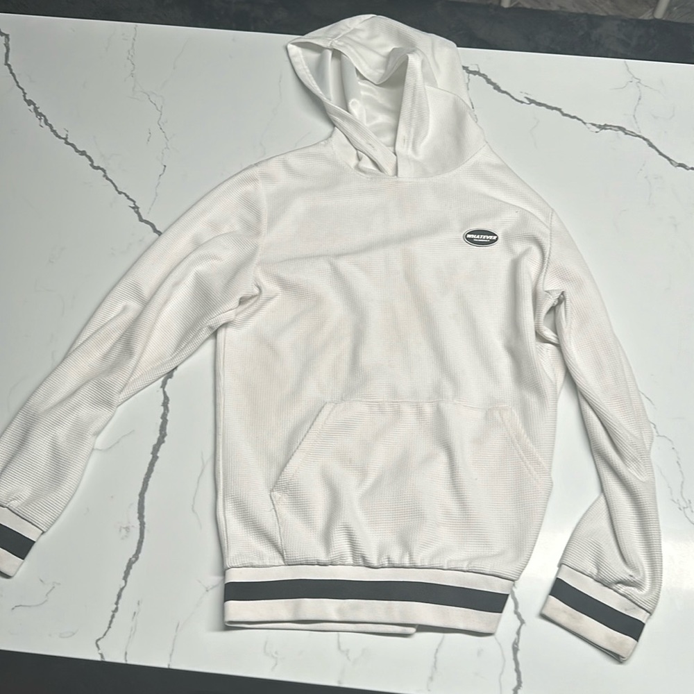 I am selling this white sweatshirt that is great for outdoor activities